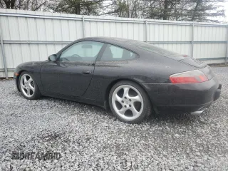 1999 Porsche 911 z VIN WP0AA2994XS625367, wystawiony jako Copart lot #51925145 z przebiegiem 70 486 mil mil oraz Szkoda całkowita • Salvage title. Historia ofert i sprzedaży dostępna na DreamBid. Obrazek 2.