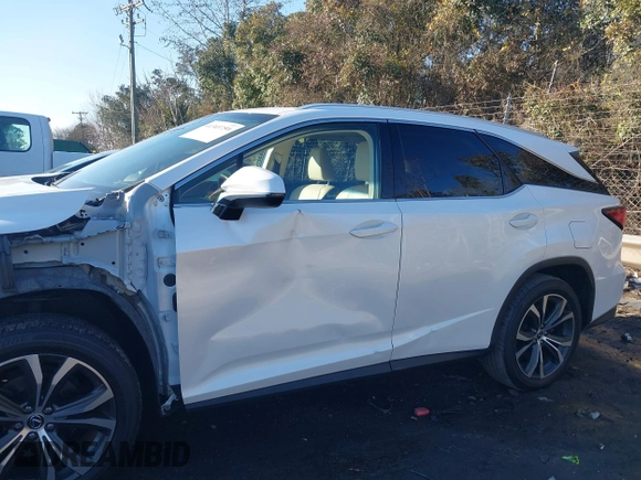 2019 Lexus RX 350L Premium with VIN JTJDZKCA0K2019725, listed as a IAAI auction lot 41303759 with 89,848 mi miles and . Bid and sale history available at DreamBid. Image 14.
