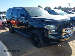 2015 Chevrolet Tahoe LT with VIN 1GNSCBKC5FR156050, listed as a IAAI auction lot 41486815 with 220,599 mi miles and . Bid and sale history available at DreamBid. Image 1.