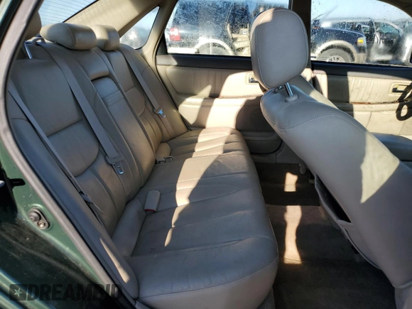2001 Toyota Avalon XL z VIN 4T1BF28B81U162506, wystawiony jako Copart lot #52031805 z przebiegiem 212 437 mil mil oraz Szkody całkowita. Historia ofert i sprzedaży dostępna na DreamBid. Obrazek 10.