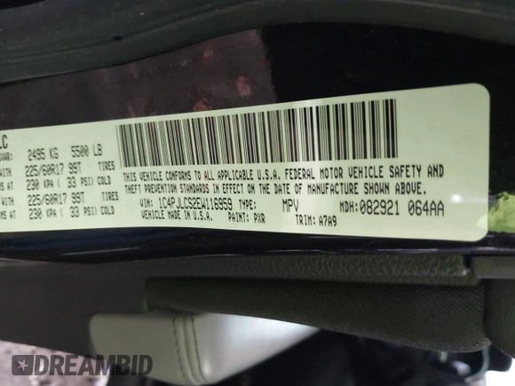 2014 Jeep Cherokee Latitude with VIN 1C4PJLCS2EW116959, listed as a IAAI auction lot 41926058 with 69,280 mi miles. Bid and sale history available at carsss.com. Image 9.
