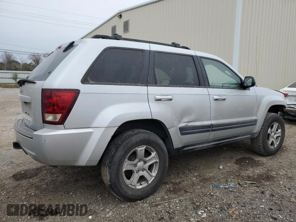 2006 Jeep Grand Cherokee Laredo with VIN 1J4HS48N26C215336, listed as a Copart auction lot 87671585 with 196,800 mi miles and Salvage Title. Bid and sale history available at carsss.com. Image 3.
