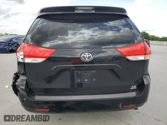 2014 Toyota Sienna LE with VIN 5TDJK3DC9ES087180, listed as a Copart auction lot 54420785 with 107,993 mi miles and Salvage title. Bid and sale history available at DreamBid. Image 6.