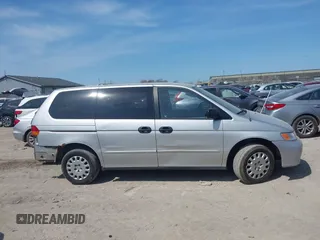 2002 Honda Odyssey LX z VIN 2HKRL18532H567409, wystawiony jako IAAI lot #42069502 z przebiegiem 173 662 mil mil oraz . Historia ofert i sprzedaży dostępna na DreamBid. Obrazek 14.
