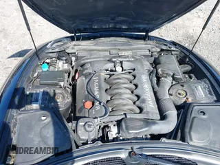2002 Jaguar XK with VIN SAJDA42C12NA30499, listed as a IAAI auction lot 41954577 with 77,152 mi miles and . Bid and sale history available at DreamBid. Image 13.