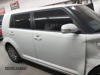 2014 Scion xB with VIN JTLZE4FE1EJ060281, listed as a IAAI auction lot 41477386 with 61,423 mi miles. Bid and sale history available at carsss.com. Image 13.
