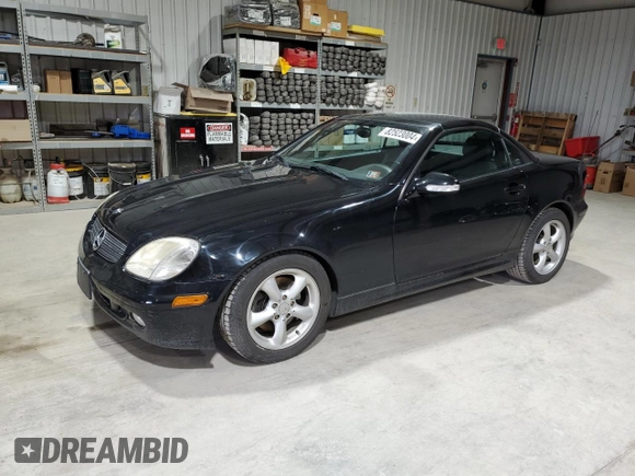 2003 Mercedes-Benz SLK 320 with VIN WDBKK65F23F277574, listed as a Copart auction lot 82523004 with 112,143 mi miles and Clean title. Bid and sale history available at DreamBid. Image 1.