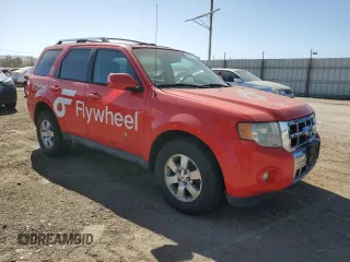 2011 Ford Escape Hybrid with VIN 1FMCU5K31BKA00016, listed as a Copart auction lot 62947255 with 390,317 mi miles and Clean title. Bid and sale history available at DreamBid. Image 4.