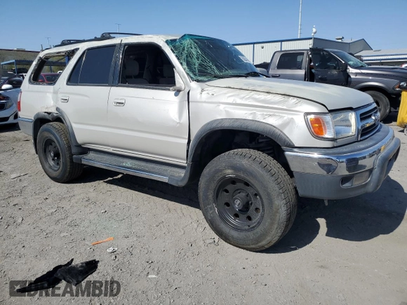 1999 Toyota 4Runner SR5 with VIN JT3GN86R4X0099618, listed as a Copart auction lot 58204145 with 297,759 mi miles and Salvage title. Bid and sale history available at DreamBid. Image 4.
