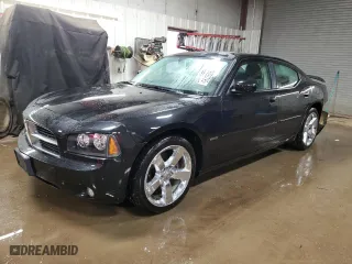 2010 Dodge Charger Road/Track with VIN 2B3CA8CT8AH288444, listed as a Copart auction lot 49392795 with 104,119 mi miles and Salvage Title. Bid and sale history available at carsss.com. Image 1.