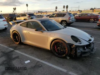 2023 Porsche 911 GT3 with VIN WP0AC2A91PS270549, listed as a Copart auction lot 78500294 with 1,636 mi miles and Salvage Title. Bid and sale history available at DreamBid. Image 4.