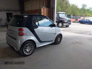 2014 Smart fortwo Pure с VIN WMEEJ3BA3EK750807, выставлен на аукционе IAAI как лот 42603379 с пробегом 99 376 миль миль и . История ставок и продаж доступна на DreamBid. Изображение 4.