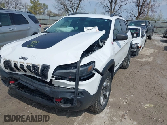 2019 Jeep Cherokee Trailhawk Elite with VIN 1C4PJMBX4KD351261, listed as a IAAI auction lot 41944727 with 97,849 mi miles. Bid and sale history available at carsss.com. Image 12.