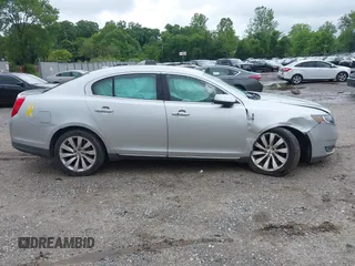 2013 Lincoln MKS with VIN 1LNHL9DK4DG606551, listed as a IAAI auction lot 42343140 with 70,424 mi miles and . Bid and sale history available at DreamBid. Image 13.
