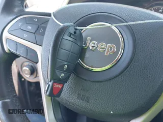 2014 Jeep Cherokee Latitude with VIN 1C4PJLCS0EW297415, listed as a IAAI auction lot 42198645 with 160,268 mi miles. Bid and sale history available at carsss.com. Image 11.