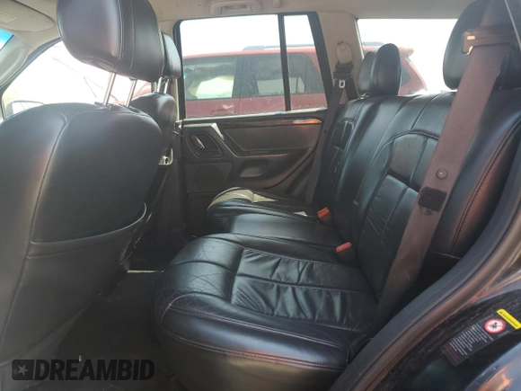2002 Jeep Grand Cherokee Limited with VIN 1J8GW58NX2C158544, listed as a Copart auction lot 54937665 with 259,089 mi miles and Salvage title. Bid and sale history available at DreamBid. Image 11.