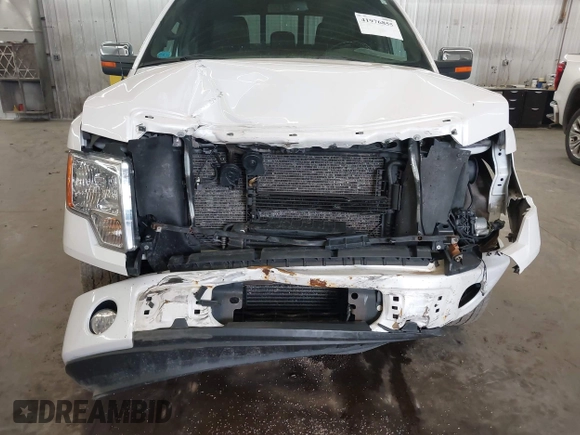 2012 Ford F-150 XL z VIN 1FTFW1CT7CFA05296, wystawiony jako IAAI lot #41976855 z przebiegiem 220 071 mil mil oraz . Historia ofert i sprzedaży dostępna na DreamBid. Obrazek 6.
