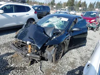 2021 Tesla Model S Long Range Plus z VIN 5YJSA1E24MF426299, wystawiony jako IAAI lot #41673498 z przebiegiem 102 035 mil mil oraz . Historia ofert i sprzedaży dostępna na DreamBid. Obrazek 2.