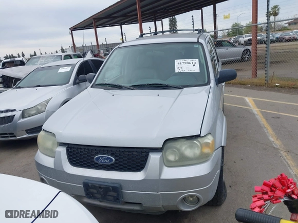 2005 Ford Escape Hybrid with VIN 1FMCU95H05KC95225, listed as a IAAI auction lot 41798610 with 216,659 mi miles. Bid and sale history available at carsss.com. Image 12.