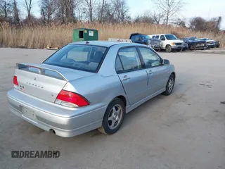2003 Mitsubishi Lancer OZ-Rally with VIN JA3AJ86E63U022390, listed as a IAAI auction lot 41542407 with 184,639 mi miles. Bid and sale history available at carsss.com. Image 4.