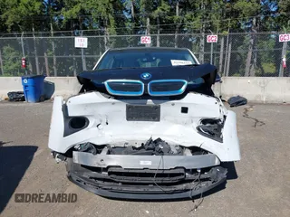2017 BMW i3 with VIN WBY1Z8C37HV890461, listed as a IAAI auction lot 42396115 with 66,359 mi miles and . Bid and sale history available at DreamBid. Image 12.