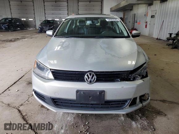 2011 Volkswagen Jetta SE z VIN 3VWDZ7AJ0BM338079, wystawiony jako Copart lot #58900585 z przebiegiem 165 055 mil mil oraz Nie do naprawy • Non repairable. Historia ofert i sprzedaży dostępna na DreamBid. Obrazek 5.