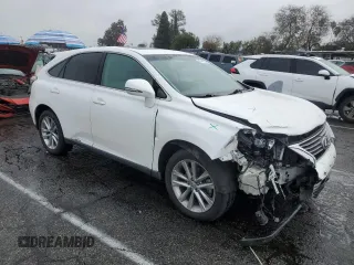2015 Lexus RX 450h with VIN 2T2ZB1BAXFC004029, listed as a Copart auction lot 43404555 with 152,635 mi miles and Salvage Title. Bid and sale history available at DreamBid. Image 4.
