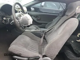 1999 Pontiac Firebird Formula z VIN 2G2FV22G4X2233748, wystawiony jako Copart lot #55693535 z przebiegiem 166 622 mil mil oraz Szkoda całkowita • Salvage title. Historia ofert i sprzedaży dostępna na DreamBid. Obrazek 7.