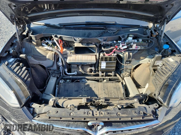 2017 Tesla Model X 90D z VIN 5YJXCBE22HF060645, wystawiony jako Copart lot #57907115 z przebiegiem 55 343 mil mil oraz Szkoda całkowita • Salvage title. Historia ofert i sprzedaży dostępna na DreamBid. Obrazek 11.