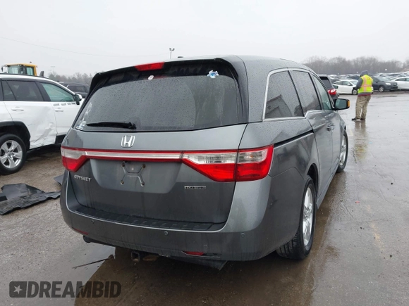 2011 Honda Odyssey Touring Elite with VIN 5FNRL5H9XBB090616, listed as a IAAI auction lot 41944510 with 207,962 mi miles and . Bid and sale history available at DreamBid. Image 4.