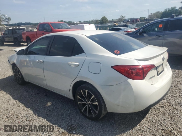 2019 Toyota Corolla L with VIN 5YFBURHE5KP921284, listed as a Copart auction lot 54277235 with 100,935 mi miles and Salvage Title. Bid and sale history available at DreamBid. Image 2.
