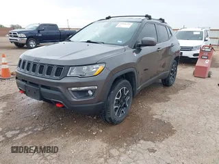 2019 Jeep Compass Trailhawk with VIN 3C4NJDDBXKT795294, listed as a IAAI auction lot 42046344 with 100,395 mi miles and . Bid and sale history available at DreamBid. Image 2.