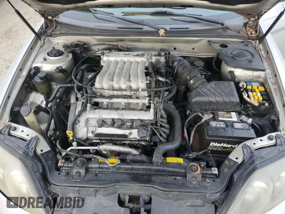 2003 Hyundai Tiburon GT z VIN KMHHN65F63U064962, wystawiony jako Copart lot #44804045 z przebiegiem 186 171 mil mil oraz Szkoda całkowita • Salvage title. Historia ofert i sprzedaży dostępna na DreamBid. Obrazek 12.