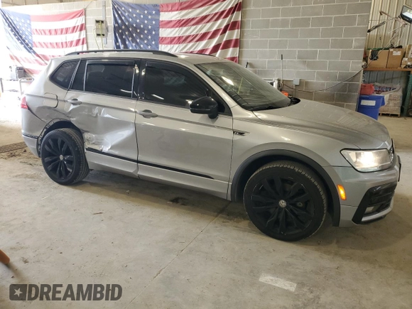 2020 Volkswagen Tiguan SE with VIN 3VV2B7AX1LM131674, listed as a Copart auction lot 54155815 with 115,555 mi miles and Salvage Title. Bid and sale history available at DreamBid. Image 4.
