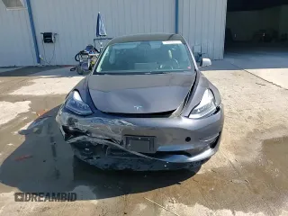 2023 Tesla Model 3 with VIN 5YJ3E1EA7PF456613, listed as a Copart auction lot 56940255 with 35,920 mi miles and Non repairable. Bid and sale history available at DreamBid. Image 13.