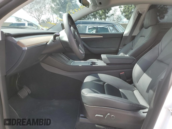 2022 Tesla Model Y Long Range with VIN 7SAYGDEE3NF558379, listed as a Copart auction lot 48594035 with 12,501 mi miles and Salvage Title. Bid and sale history available at carsss.com. Image 7.