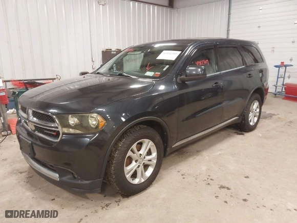 2013 Dodge Durango SXT with VIN 1C4RDJAG8DC500490, listed as a IAAI auction lot 41982309 with 183,861 mi miles. Bid and sale history available at carsss.com. Image 2.