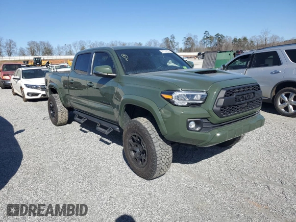 2021 Toyota Tacoma 4WD SR5 with VIN 3TMDZ5BN3MM111433, listed as a Copart auction lot 47736135 with 73,061 mi miles and Salvage Title. Bid and sale history available at carsss.com. Image 4.
