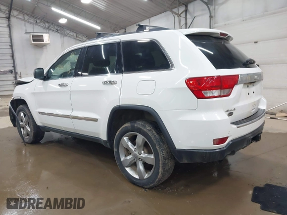 2013 Jeep Grand Cherokee Overland with VIN 1C4RJFCT1DC586886, listed as a IAAI auction lot 41941590 with 125,126 mi miles. Bid and sale history available at carsss.com. Image 3.