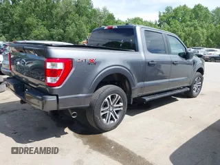 2023 Ford F-150 XL with VIN 1FTFW1E54PFC37083, listed as a IAAI auction lot 42247096 with 28,344 mi miles and . Bid and sale history available at DreamBid. Image 4.