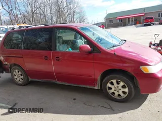 2003 Honda Odyssey EX-L with VIN 5FNRL18923B130410, listed as a IAAI auction lot 41814211 with 209,335 mi miles and . Bid and sale history available at DreamBid. Image 13.