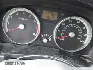2009 Hyundai Accent Auto SE with VIN KMHCN36C69U112207, listed as a IAAI auction lot 41641298 with 166,804 mi miles. Bid and sale history available at carsss.com. Image 7.