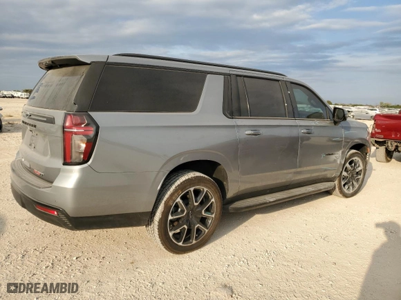2023 Chevrolet Suburban RST with VIN 1GNSCEKD9PR556589, listed as a Copart auction lot 76045104 with 7,411 mi miles and Salvage Title. Bid and sale history available at carsss.com. Image 3.