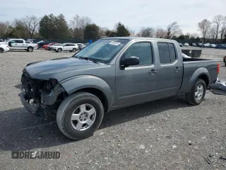 2007 Nissan Frontier SE z VIN 1N6AD09U57C437268, wystawiony jako Copart lot #49835405 z przebiegiem 145 232 mil mil oraz Szkoda całkowita • Salvage title. Historia ofert i sprzedaży dostępna na DreamBid. Obrazek 1.