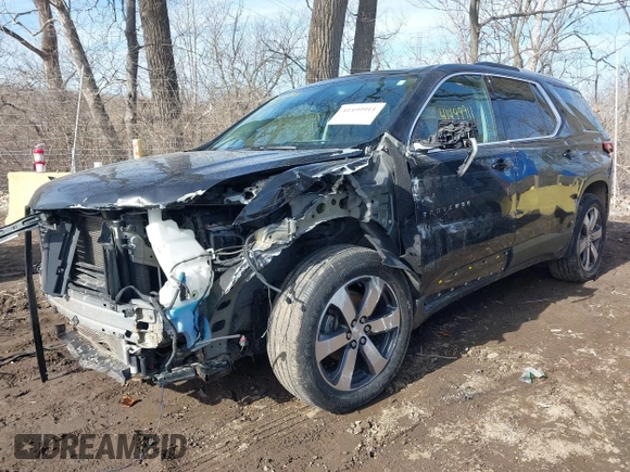 2018 Chevrolet Traverse LT z VIN 1GNEVHKWXJJ199472, wystawiony jako IAAI lot #41499911 z przebiegiem 129 127 mil mil oraz . Historia ofert i sprzedaży dostępna na DreamBid. Obrazek 6.