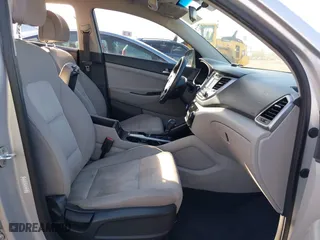 2016 Hyundai Tucson Sport with VIN KM8J33A20GU152145, listed as a IAAI auction lot 41250885 with 117,841 mi miles. Bid and sale history available at carsss.com. Image 5.