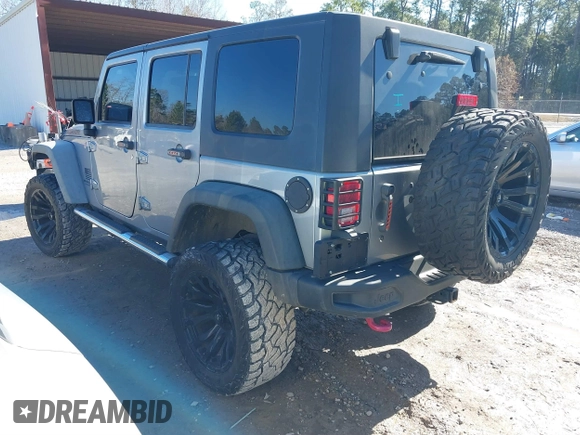 2015 Jeep Wrangler Unlimited Rubicon Hard Rock with VIN 1C4HJWFG2FL587607, listed as a IAAI auction lot 41419237 with 109,719 mi miles and . Bid and sale history available at DreamBid. Image 3.