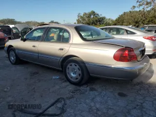 2000 Lincoln Continental with VIN 1LNHM97V4YY832947, listed as a Copart auction lot 83350184 with 164,389 mi miles and Salvage Title. Bid and sale history available at carsss.com. Image 2.