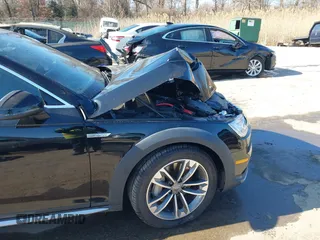 2019 Audi A4 allroad Premium Plus with VIN WA18NAF42KA009729, listed as a IAAI auction lot 41698959 with 60,893 mi miles. Bid and sale history available at carsss.com. Image 18.
