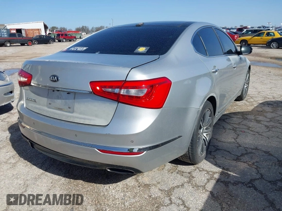 2015 Kia Cadenza Premium with VIN KNALN4D74F5173557, listed as a IAAI auction lot 41702351 with 104,087 mi miles and . Bid and sale history available at DreamBid. Image 4.